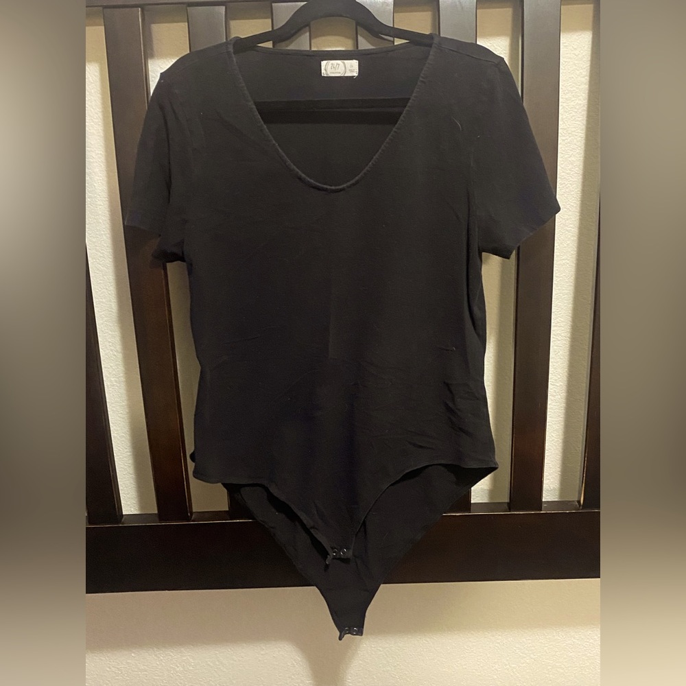 Maurice’s black bodysuit
